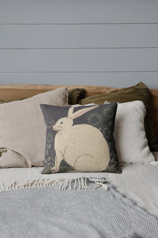 Bed styled with a Hook and Loop Rabbit Pillow