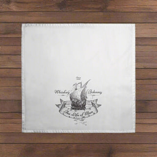 Whiskey Johnny nautical bar towel hanging in a coastal-themed kitchen