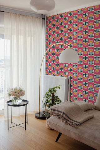 Retro floral hot pink drawer liner shown as fabric wallpaper in room overlooking city.