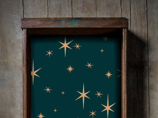 Teal and retro star peel and stick drawer liner. Midcentury modern drawer liner shown in refinished drawer.