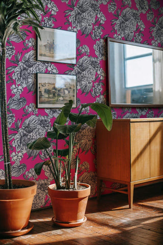 Bold hot pink black and white floral shelf liner displayed as wallpaper